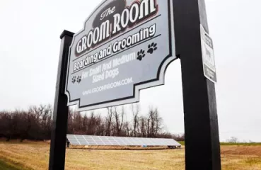 The Groom Room in Hawley, MN with solar array in distance
