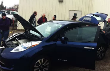 Attendees kick the tires on electric vehicles in Little Falls