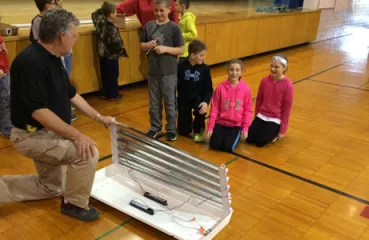 Students learn about new lighting system being installed