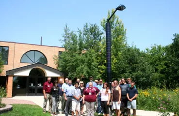 Students, staff, and faculty in the Nature Nook with the new light