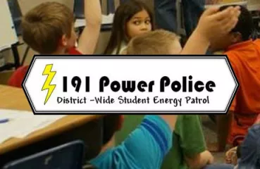 Author Fernando Vasquez teaching young students about vampire power; energy used when electronics are plugged in, but turned off.