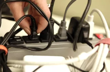 Fully loaded power strip | Photo by Richard Drew, AP