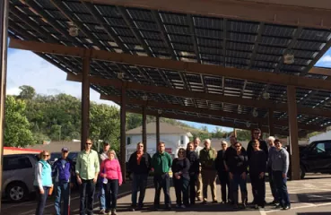 SE CERT tours Red Wing solar projects, including this carport at City Hall