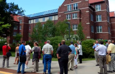 Touring solar installations at Carleton College before learning about community solar opportunities