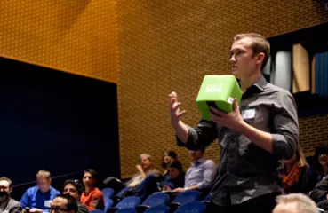Attendees tossed around a speaker box to share their perspectives