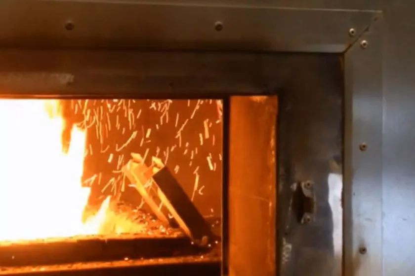 A peek into the biomass furnace at broiler chicken operation Viking Company in Albany, MN during a recent tour.