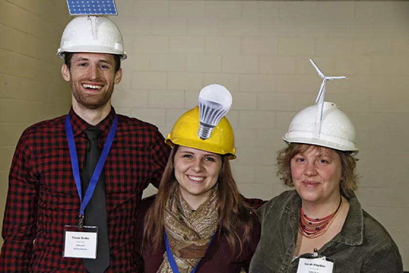 People with energy-themed hats