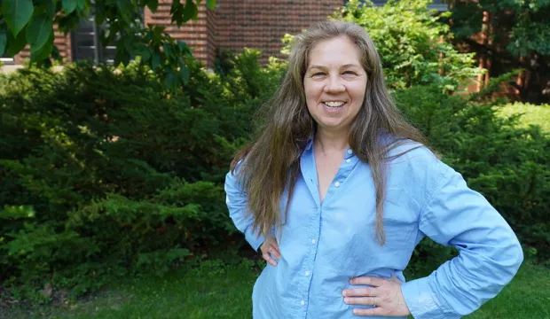 Maggie Kozak stands outside smiling, with her hands on her hips..jpg (144.43 KB)