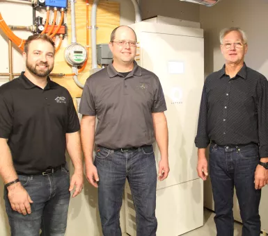 MiEnergy Cooperative staff and member