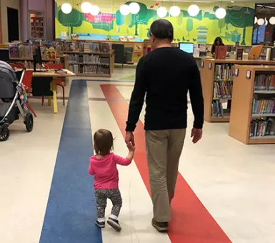 John Suzukida with grandchild