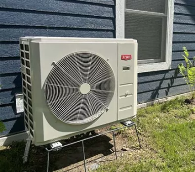 Condenser outside new construction home