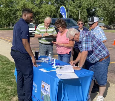 People signing in at ride and drive event