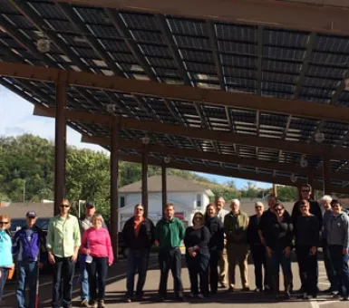 SE CERT tours Red Wing solar projects, including this carport at City Hall